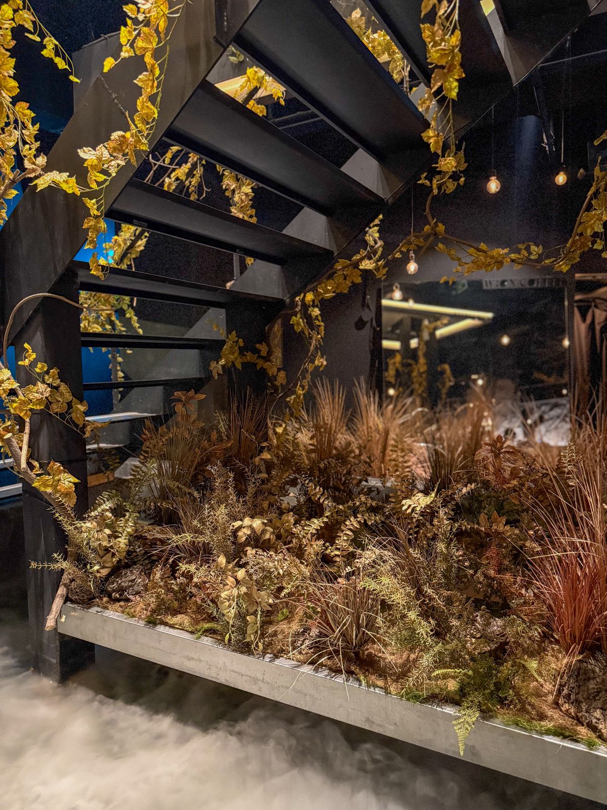 W.ON Cafe interior planting with reflecting pool