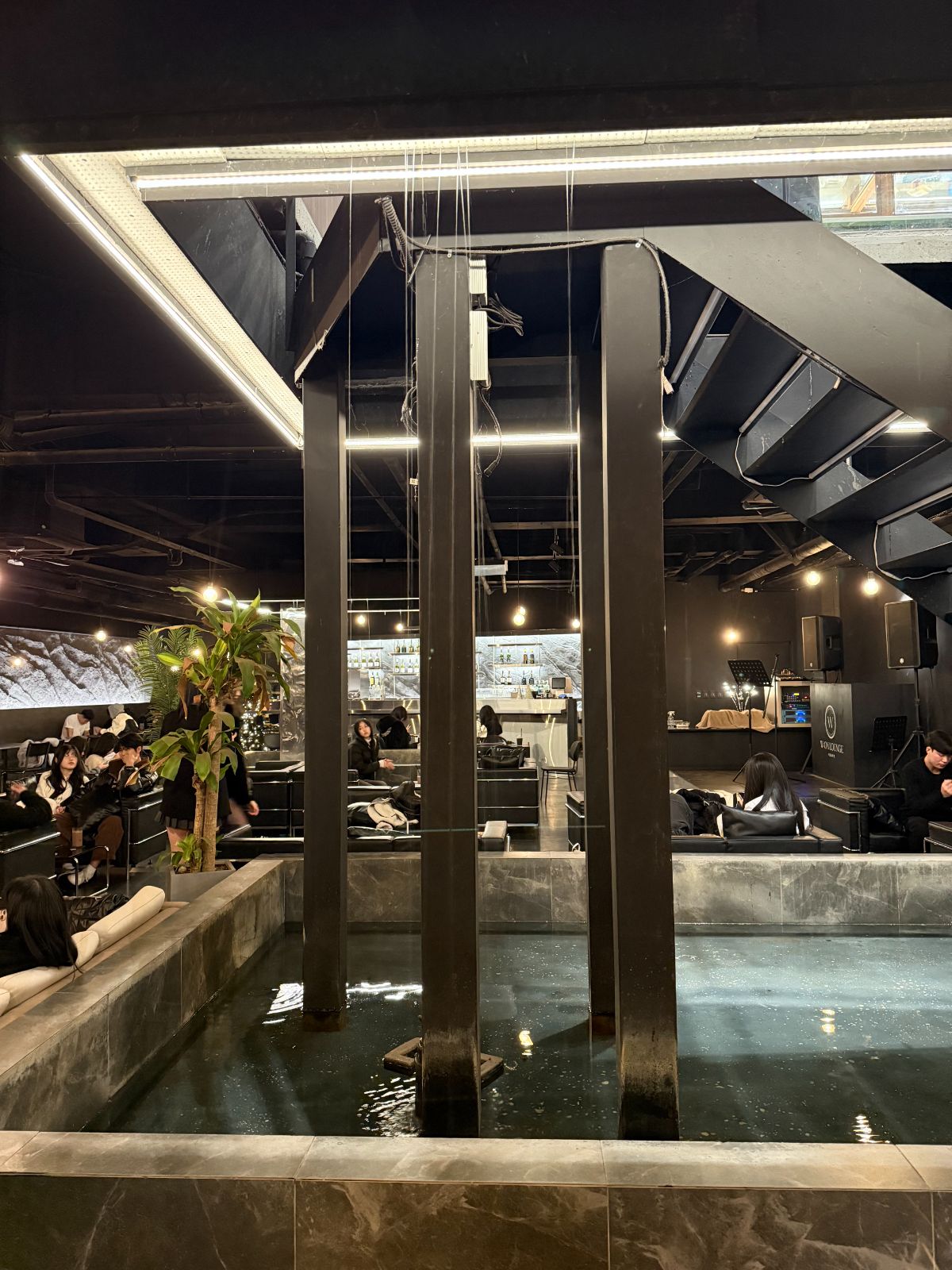 W.ON Cafe interior planting with reflecting pool